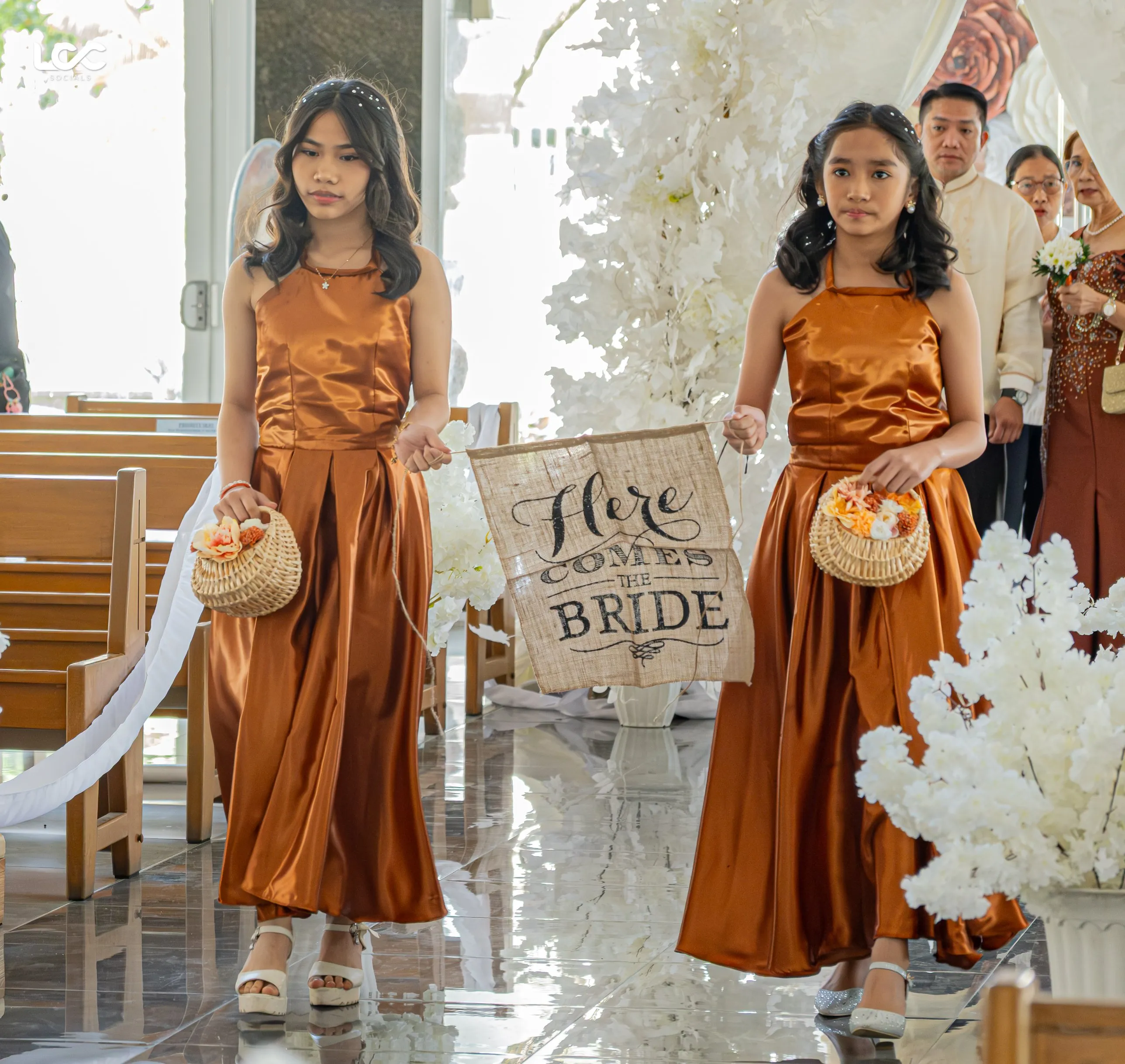 Bridal party in gold at a church wedding
